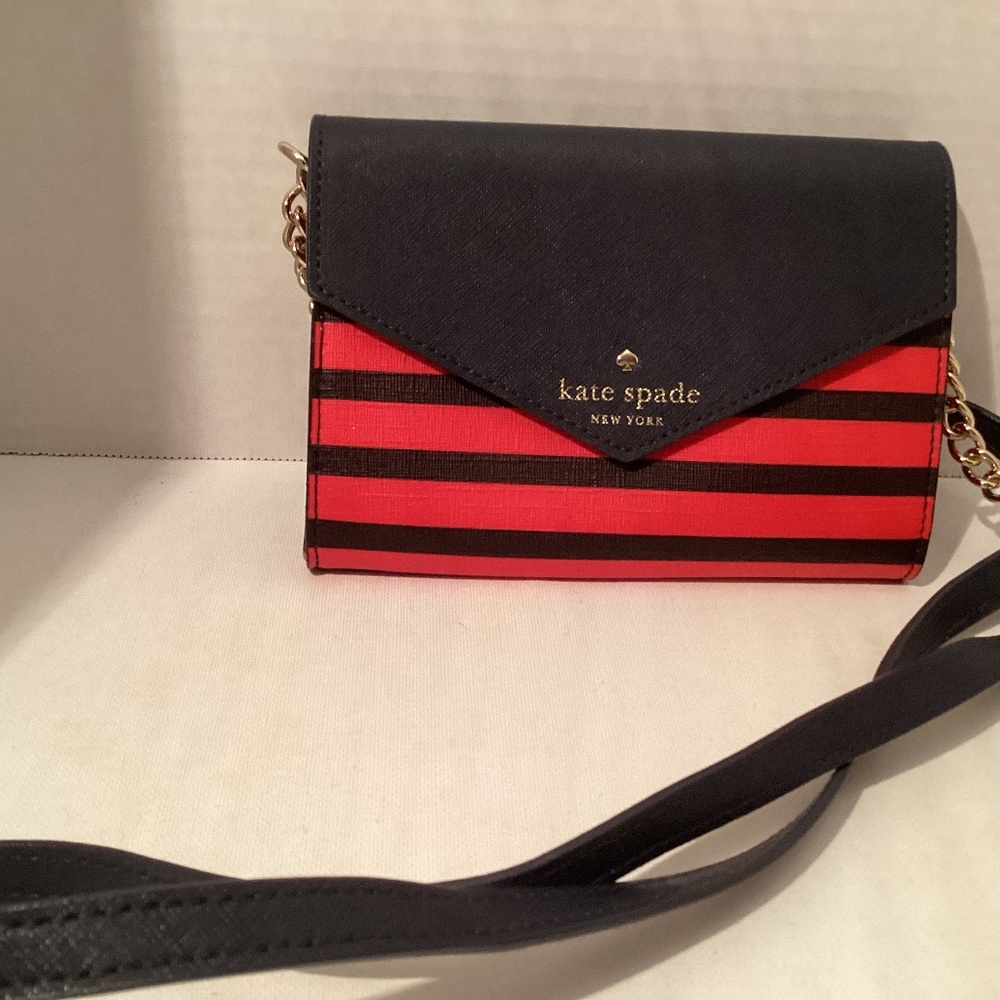 Kate spade cross body navy and red bag with gold chain on straps